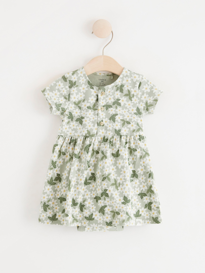 Kortärmad blommig klänning med dold body
