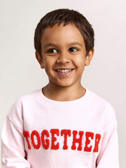 Sweatshirt med text