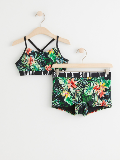 Bikini med tropiska blommor