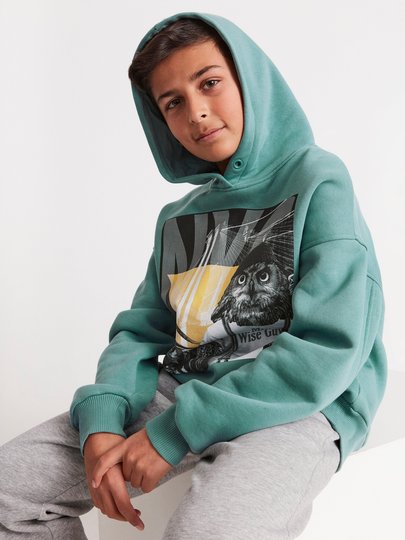 Hoodie med ett tryck med en uggla